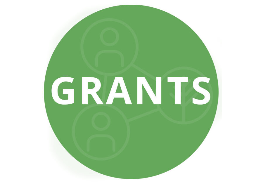 Green circle with white word Grants in all capital letters